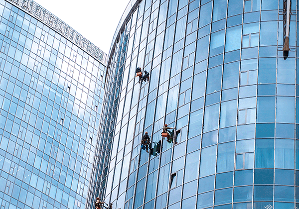 workers-washing-windows-office-building